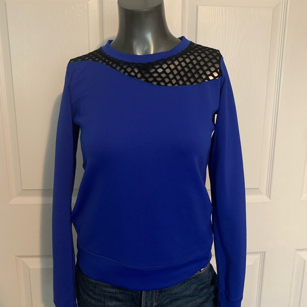 Blue and black top. Long sleeve. Side zipper detail. Size s